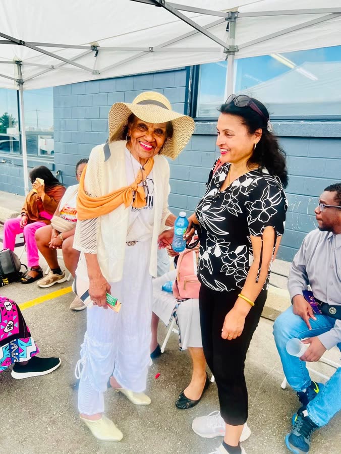 A moment with a community elder at a block party