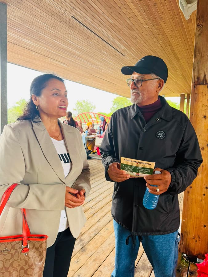 Sharing the Hello Neighbour card with a resident