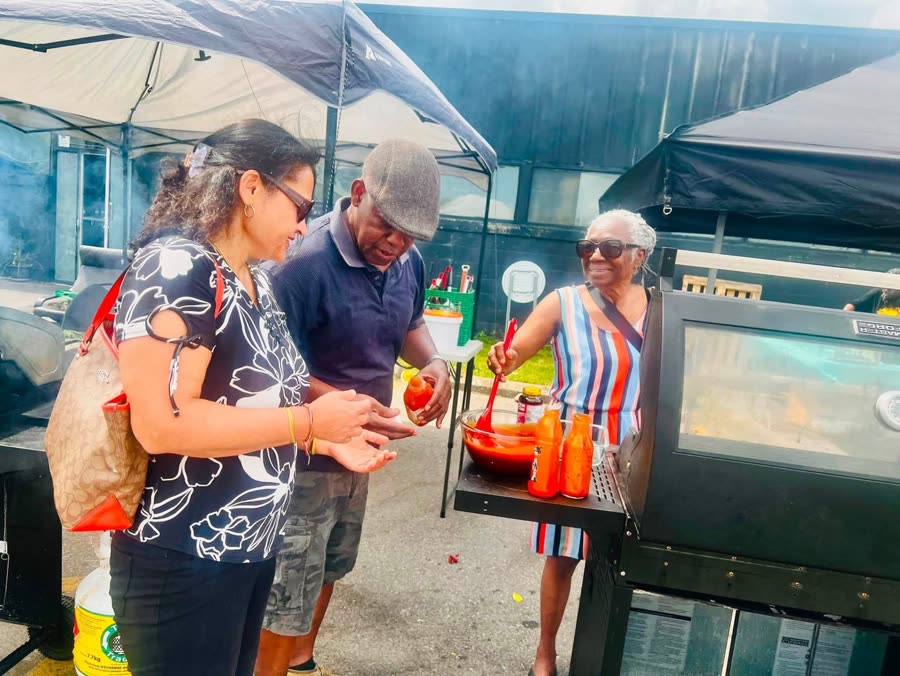 At a neighbourhood barbecue with local organizers